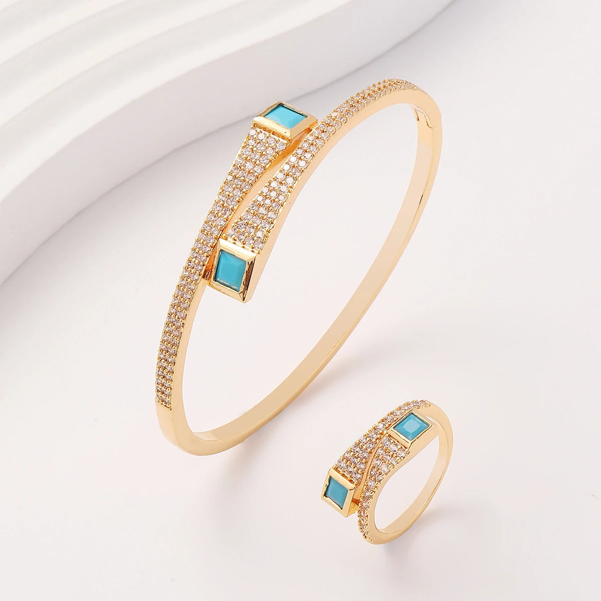 A set of women's new European and American light luxury exquisite trend turquoise zirconium inlaid bracelet ring set