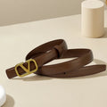 Women's belt with V letter alloy buckle, meticulously crafted from durable PU material. Featuring a sleek, modern design that ex