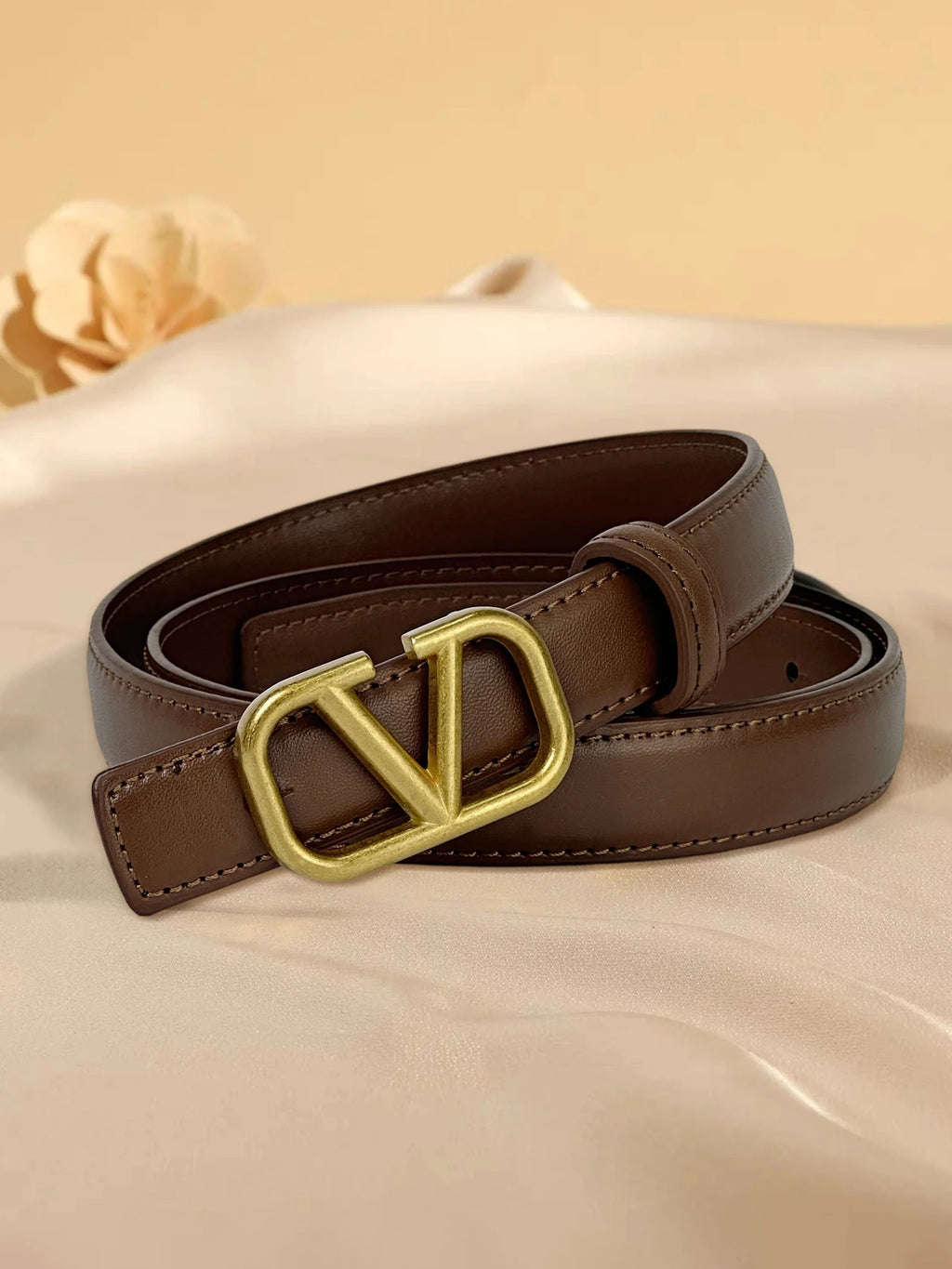 Women's belt with V letter alloy buckle, meticulously crafted from durable PU material. Featuring a sleek, modern design that ex